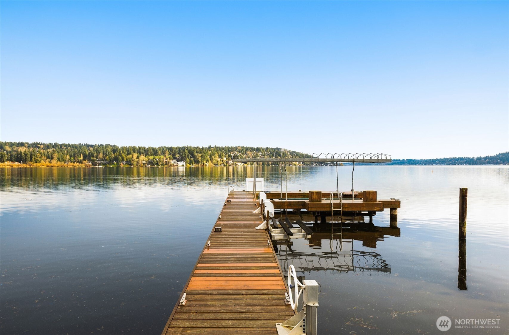 expansive dock invites boating, sunset lounging and effortless enjoyment of waterfront lifestyle. Deeper water toward the end of the dock is 7ft. - Supports larger boats and visiting guests arriving by boat or seaplane.