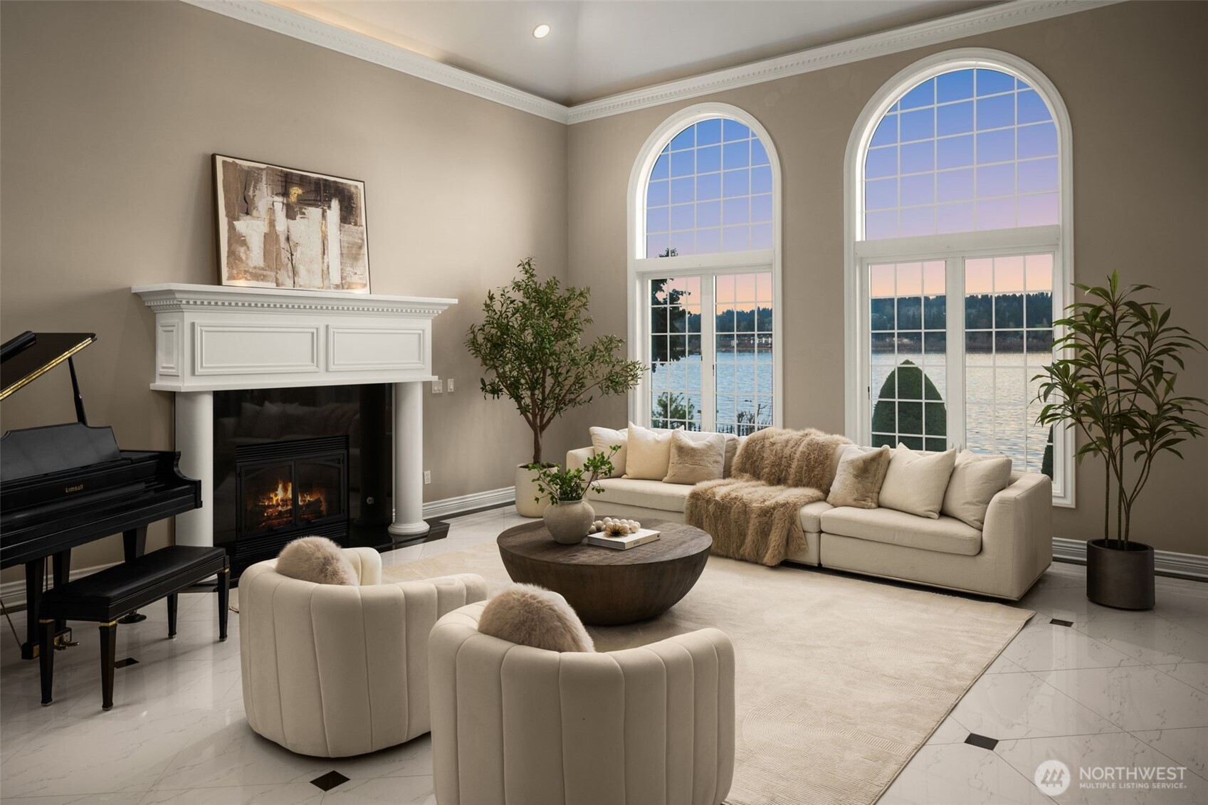 Tall arched windows frame tranquil Lake Washington views.
