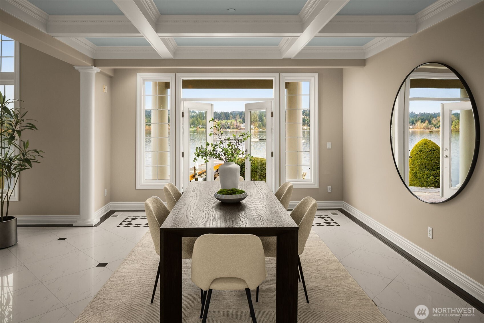 Dining framed by columns and coffered ceilings, aligned to Lake Washington through French doors.