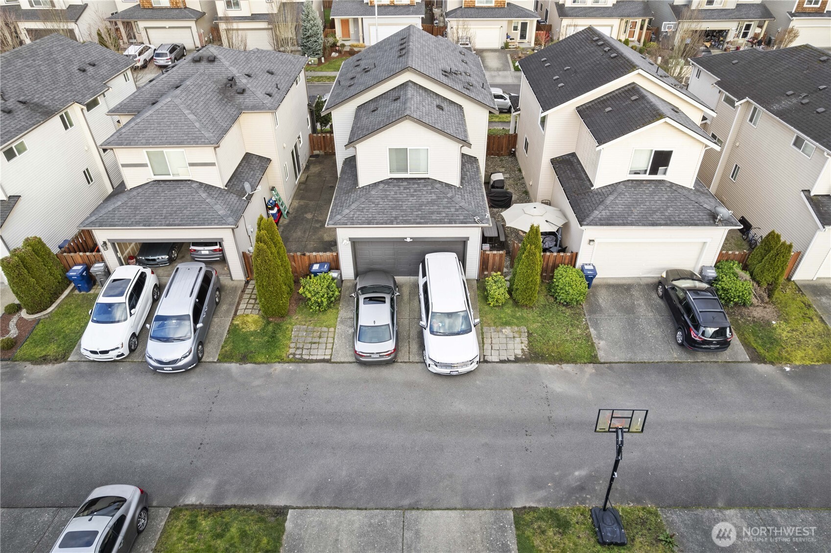Alley access to 2 car garage & driveway parking