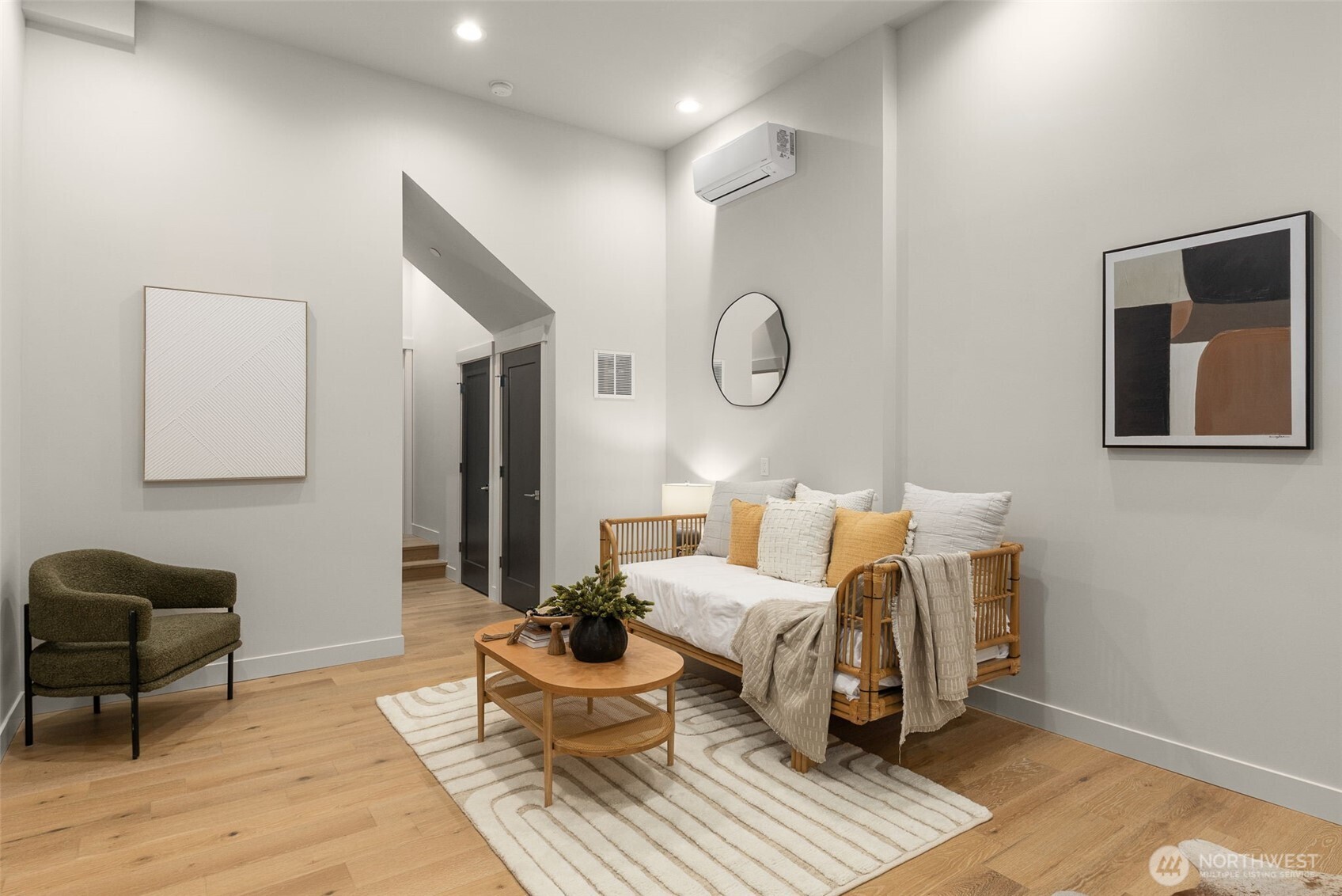 Welcoming entry level featuring a versatile guest suite with a full bed and bath.