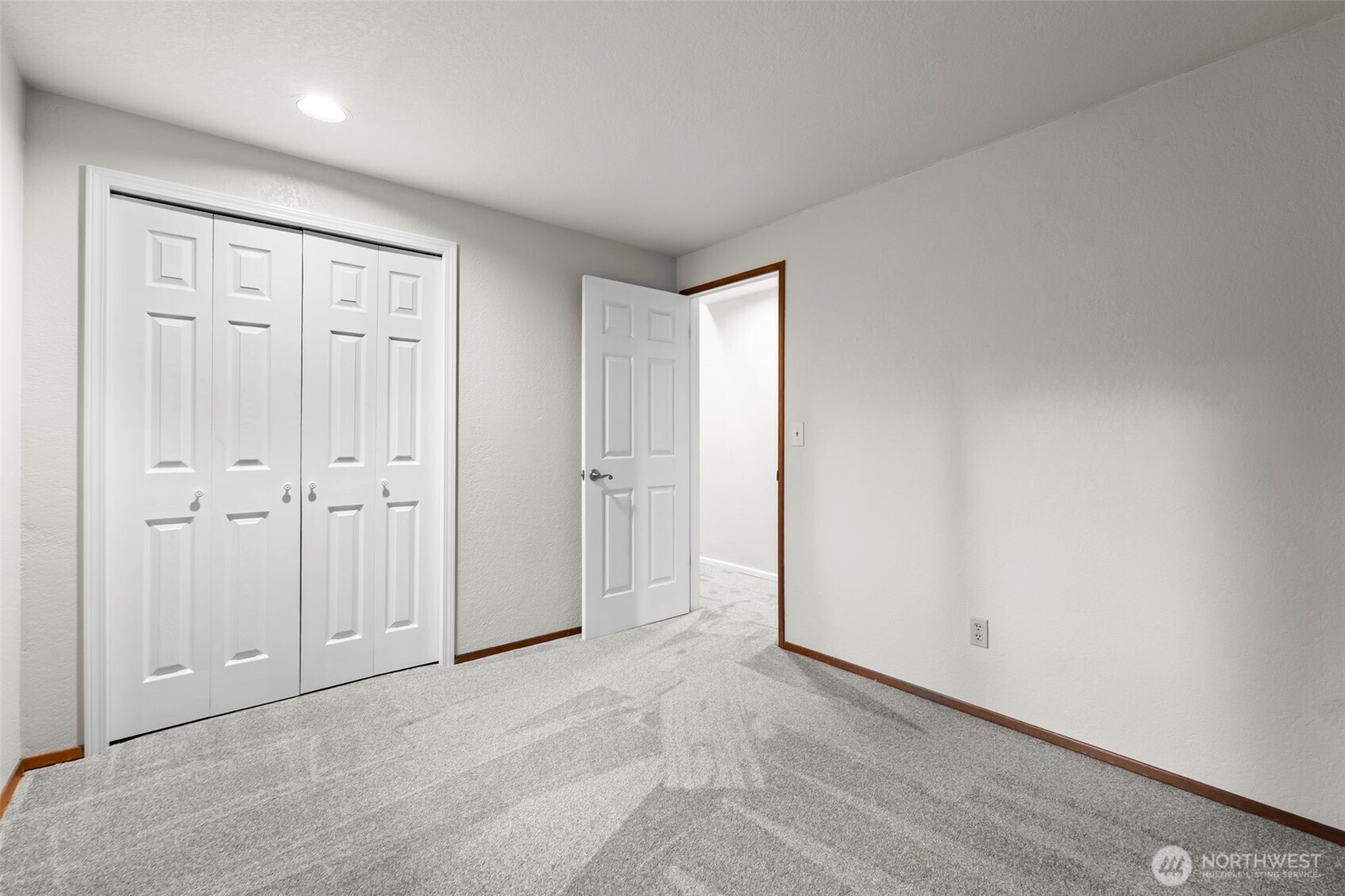 One of the three bedrooms on the main floor.