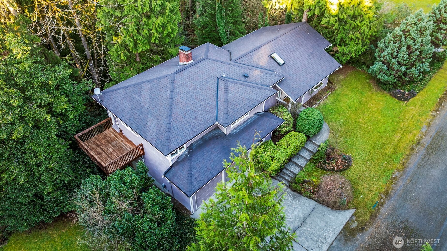So many options with this private 1/2 acre corner lot.