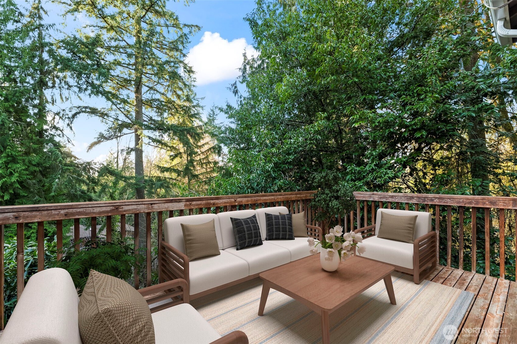 Spacious dining room with room for a large table and deck access.