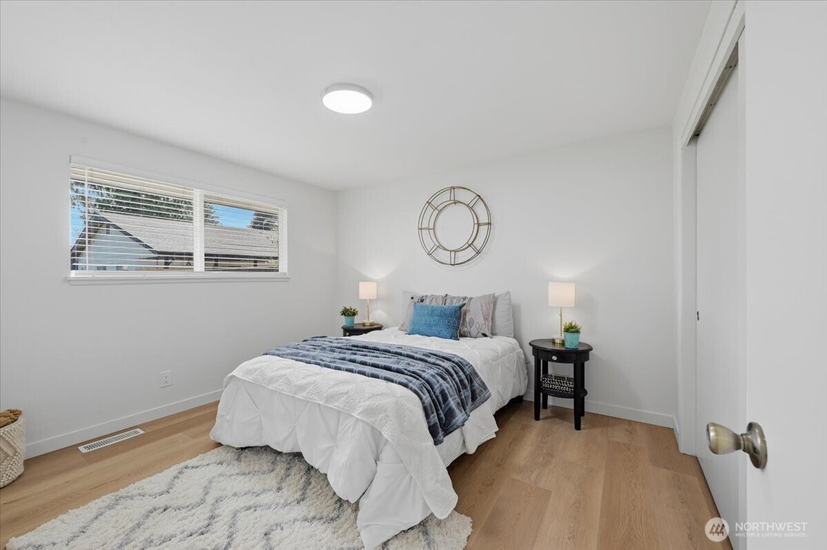 Primary bedroom with En-suite bath. New window treatments throughout.