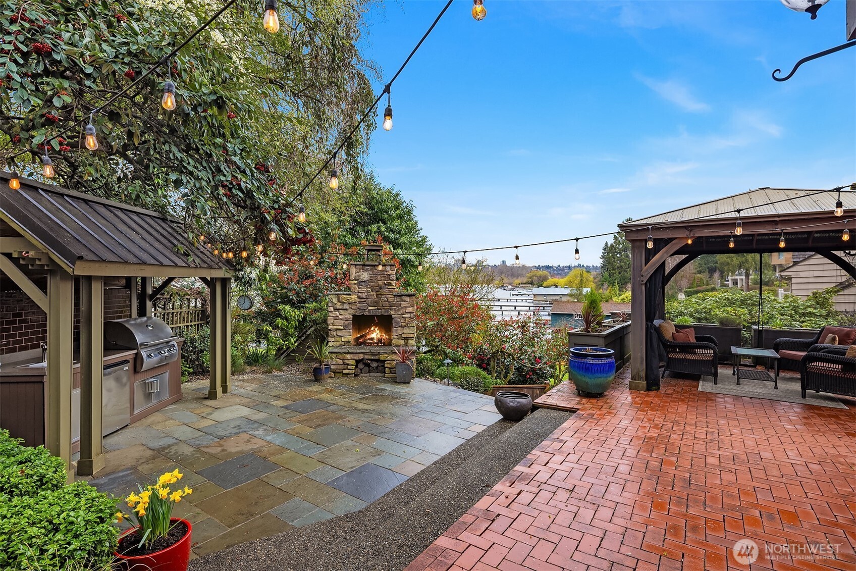 Outdoor entertainment area with built in barbecue, fire place and Gazebo