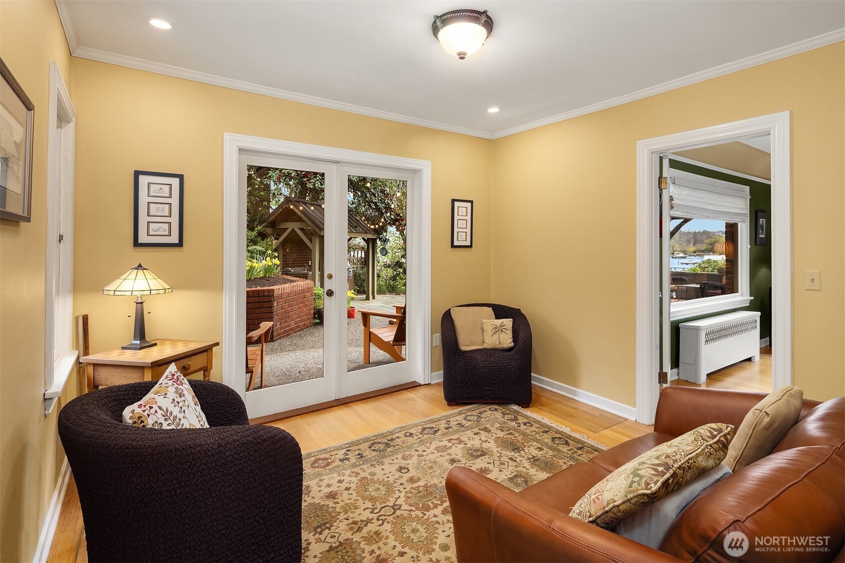 Sitting room located off the living room with access to back private patio