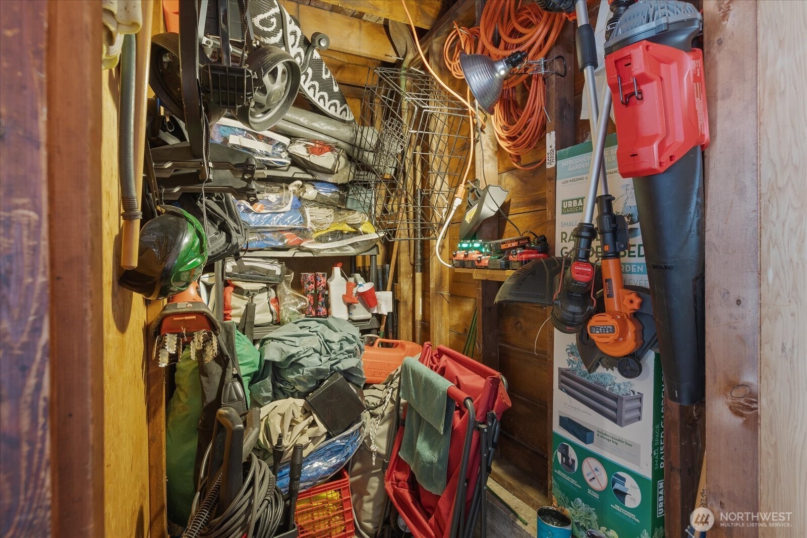 Additional storage area located inside the detached garage.