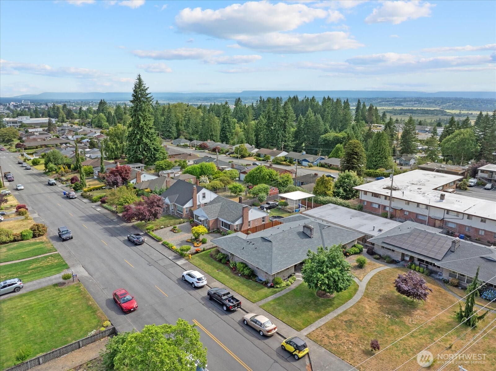 Corner-lot home located in a well-established Everett neighborhood with mature landscaping and inviting curb appeal.