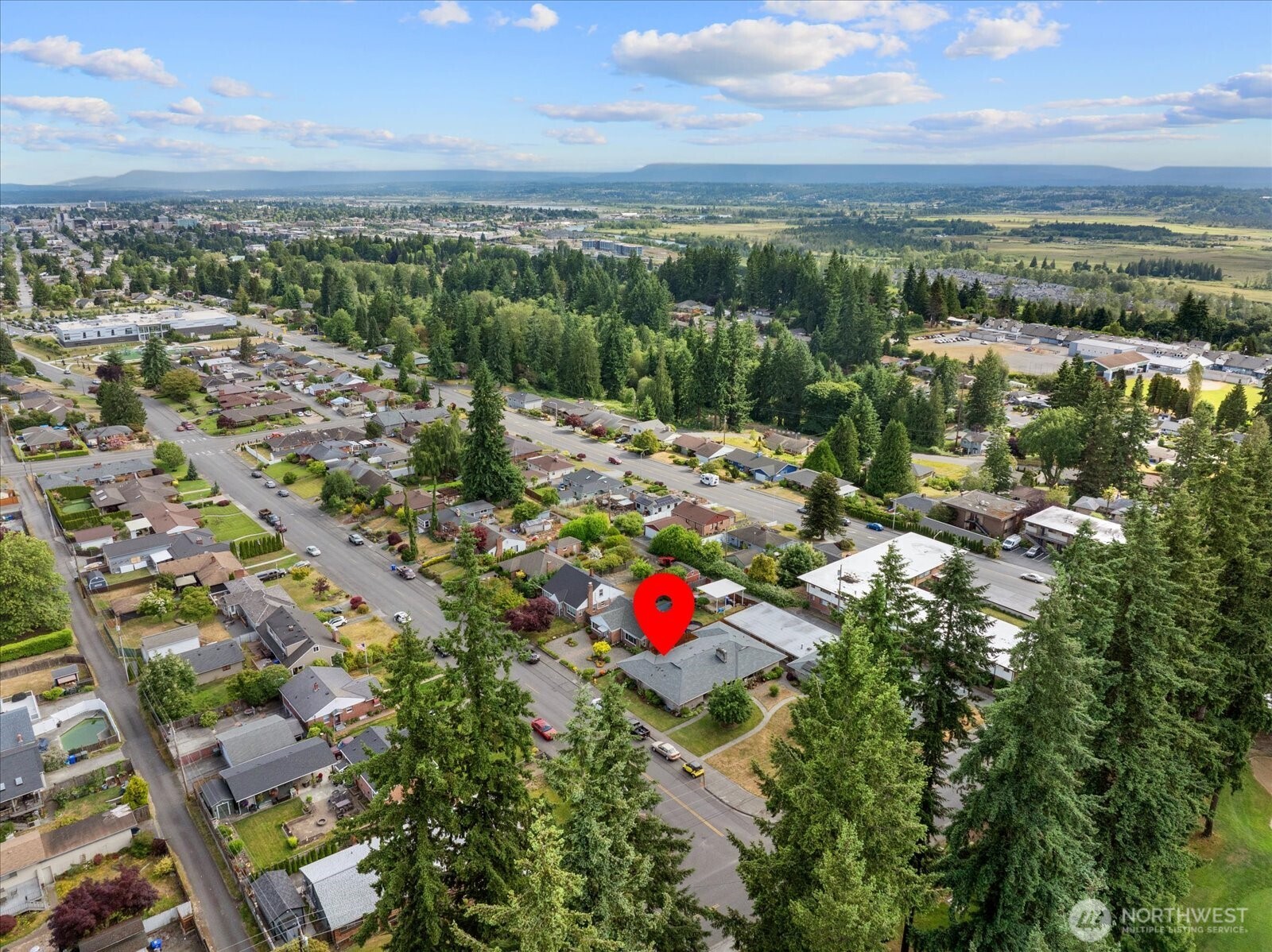 Aerial view highlighting the home's position within the neighborhood.
