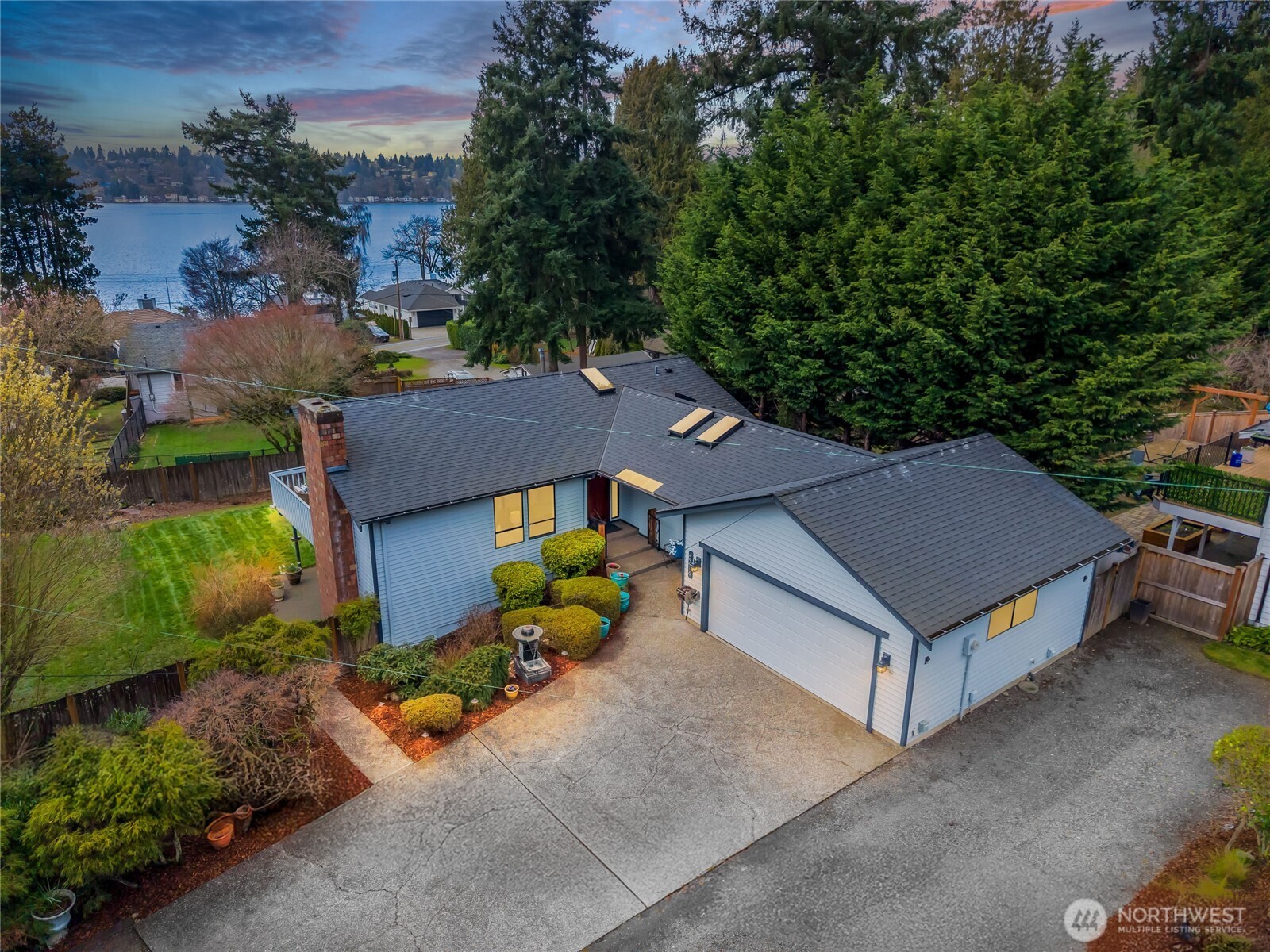 Fully-fenced front yard on the entertaining side of the home!