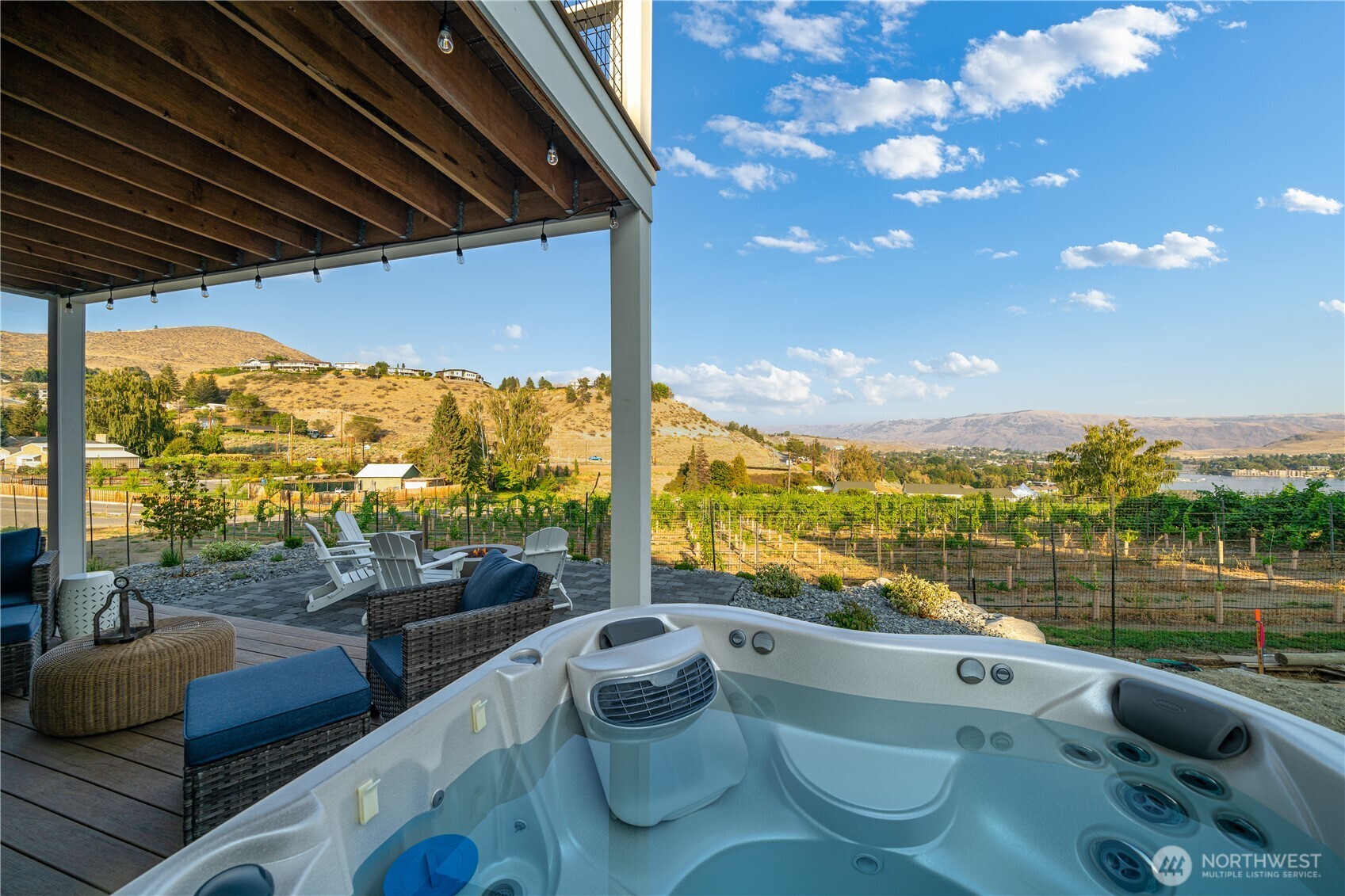 View of lower level private hot tub overlooking the Vin du Lac vineyards and Lake Chelan.