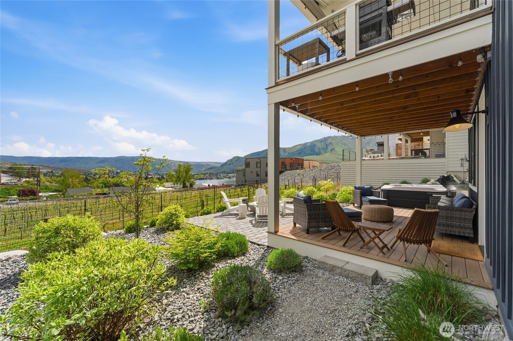 Lower level outdoor living overlooking the Vin du Lac Vineyards.