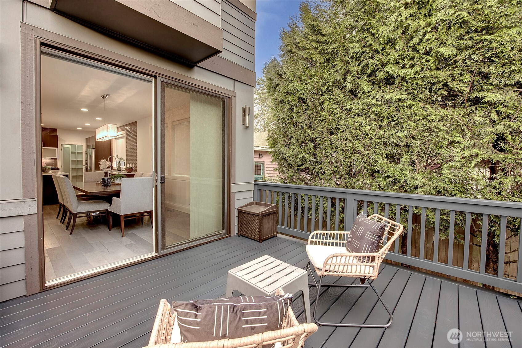 Sunny deck and fully fenced backyard.