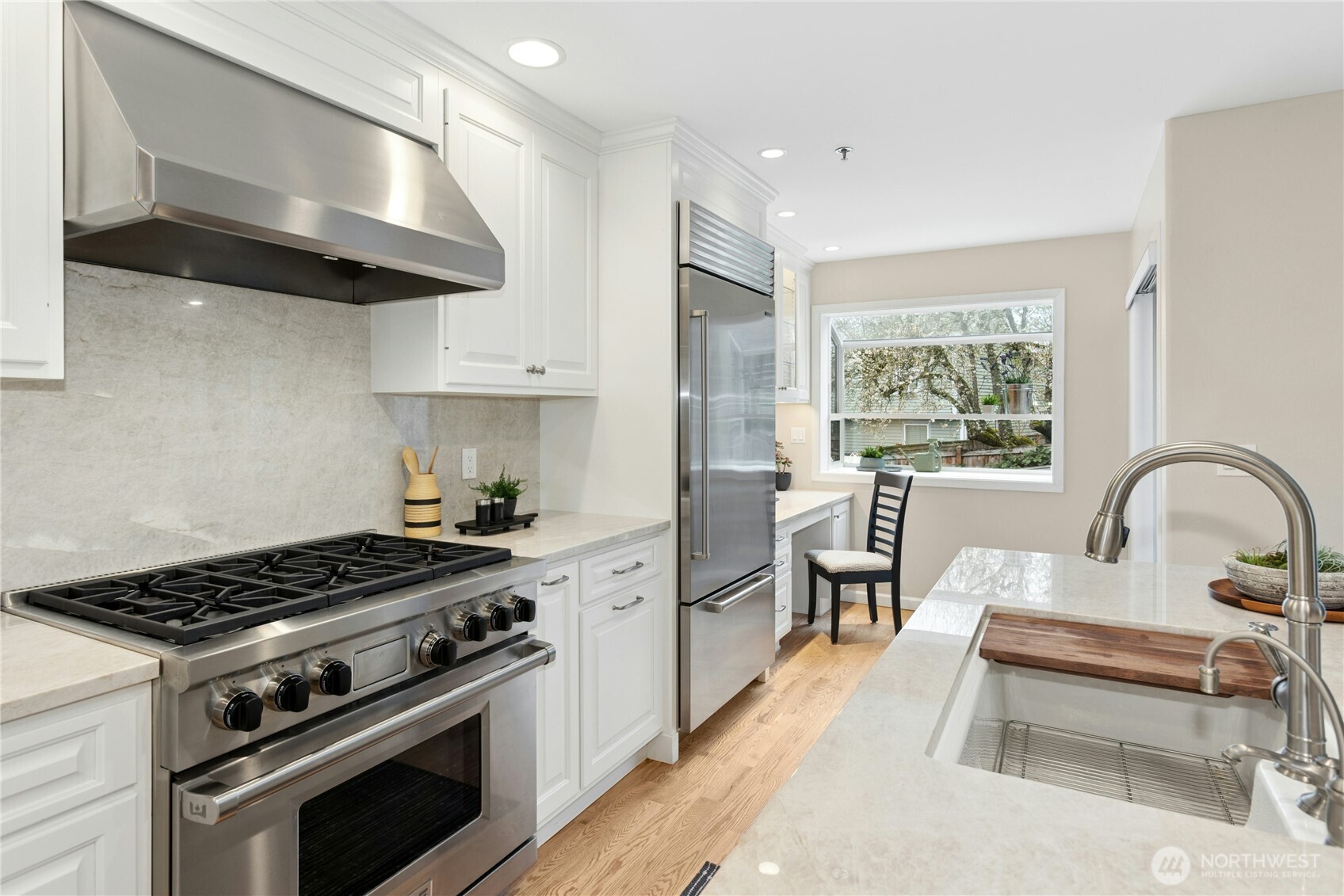 Another look at this fabulous kitchen! Note the quartzite backsplash for easy clean up.