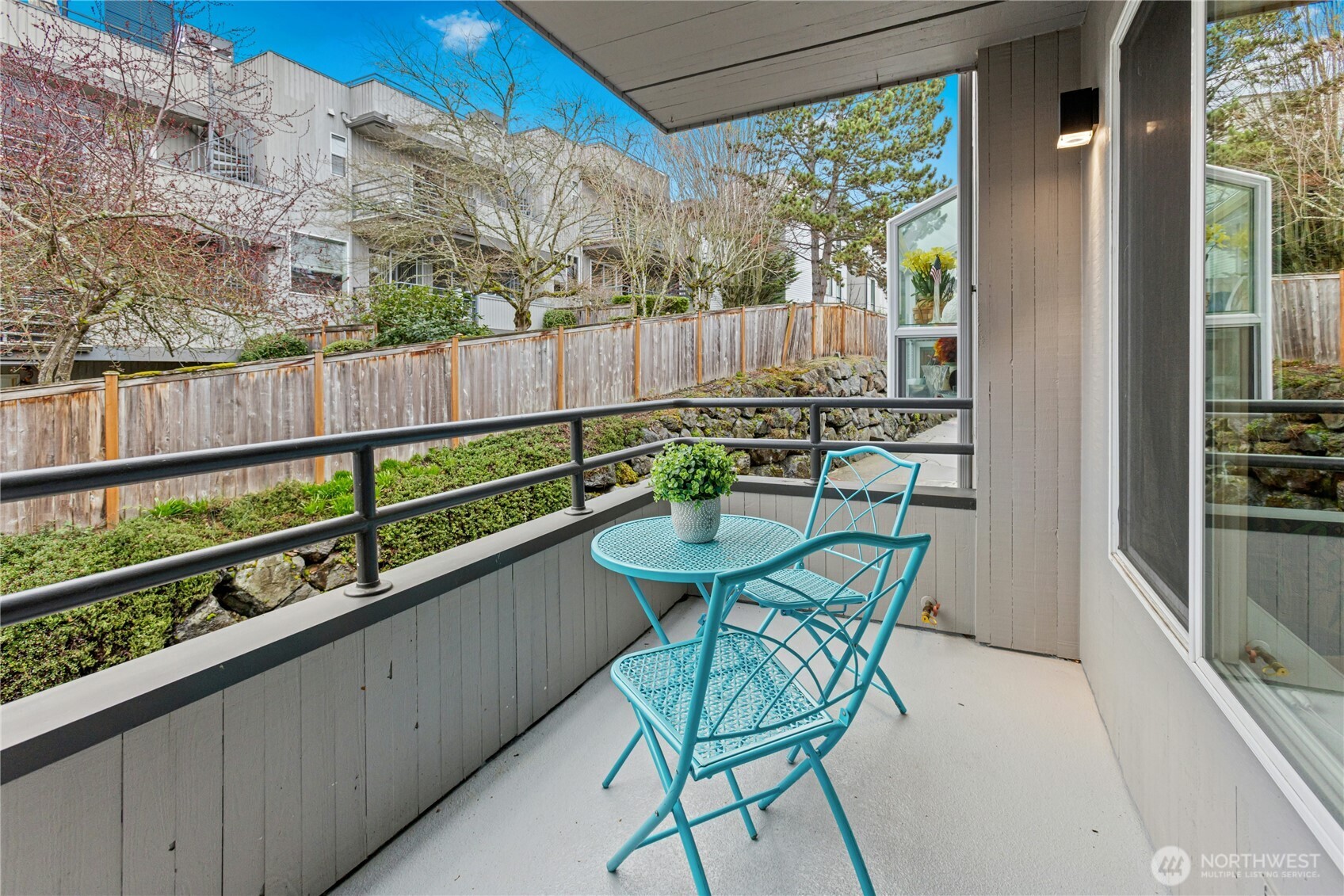 Another relaxing balcony is just off the kitchen. Note: this is plumbed for gas. Bring your grill and invite your friends for a BBQ!