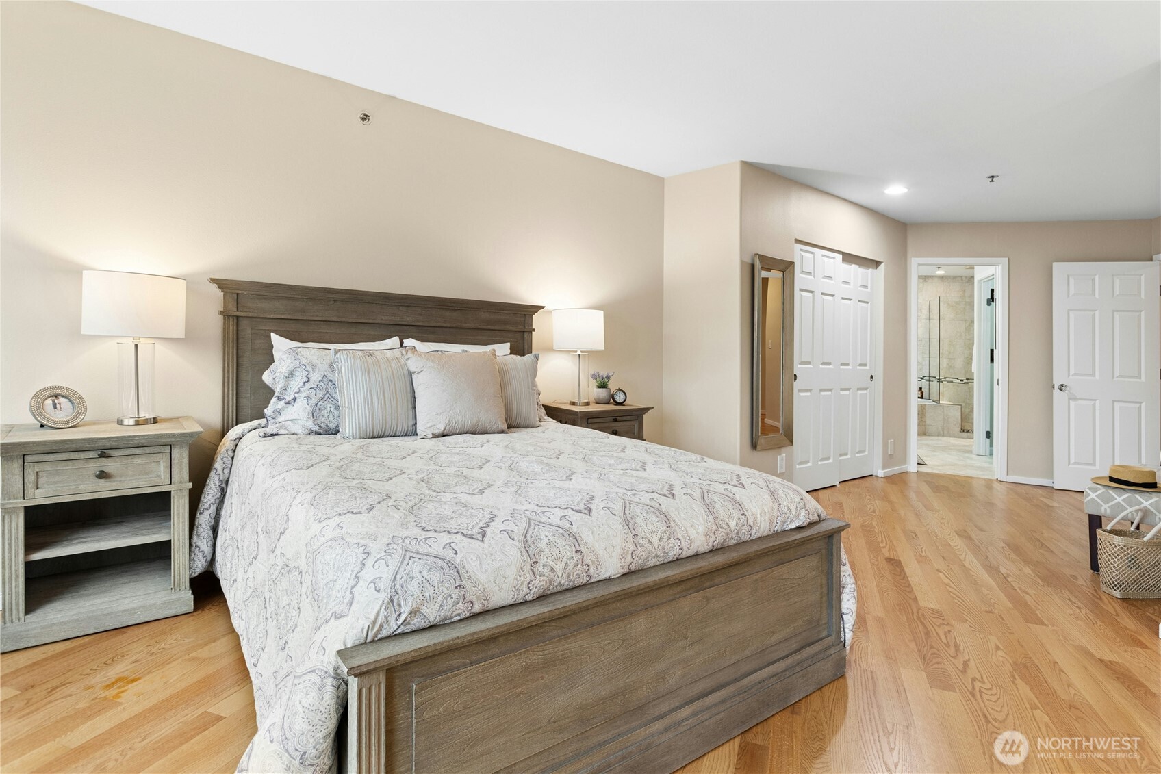 The primary suite is adjacent to the 5-piece bath and has 2 closets: one large reach-in closet and one large walk-in closet.