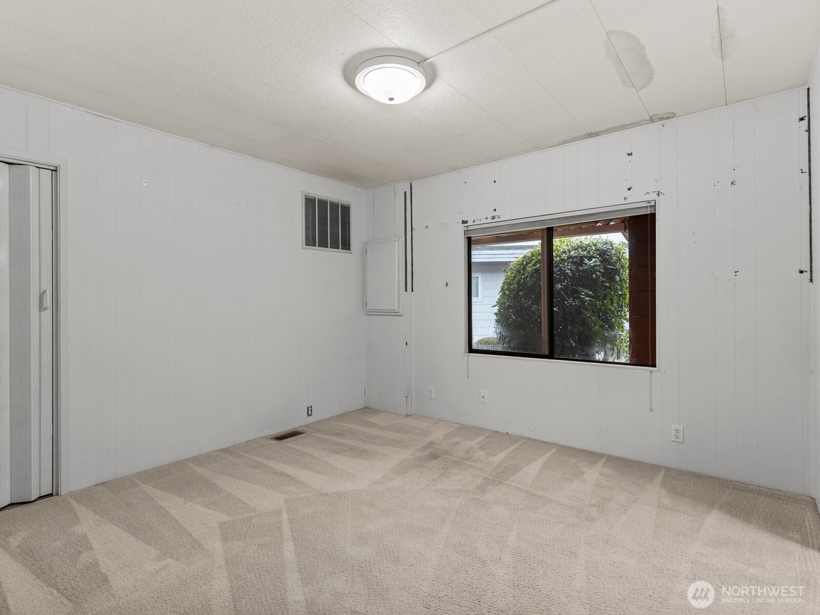 The 1st of 2 bedrooms is great for a home office or for overnight guests.