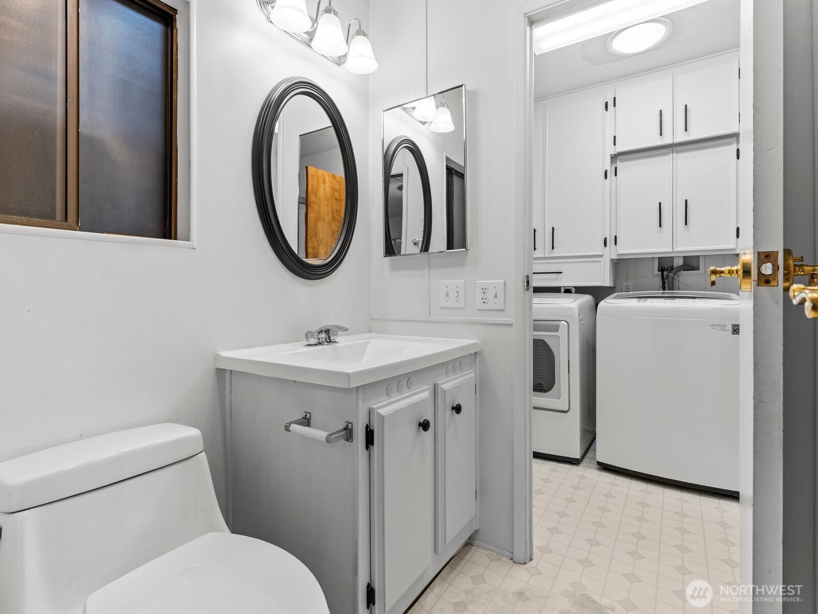 The attached bathroom has dual access.