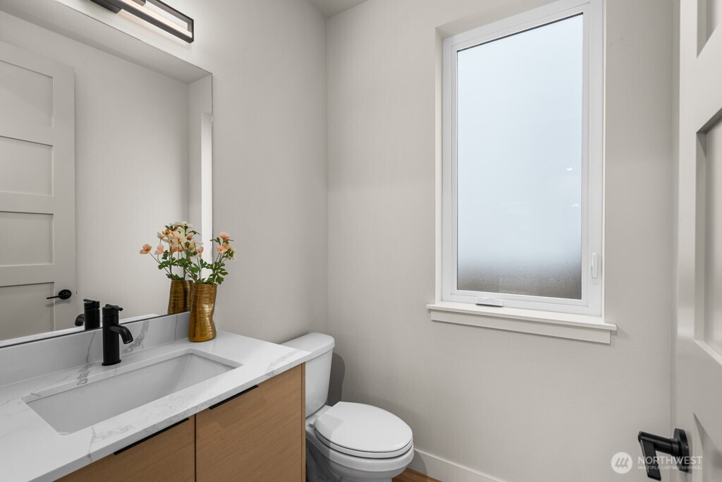 The must-have den/office/flex room, on the main floor off the kitchen.