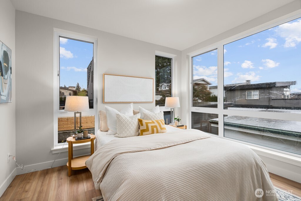 The upstairs hall bath with large tub and mosaic-look tile. Heated floors in this bathroom, as well.