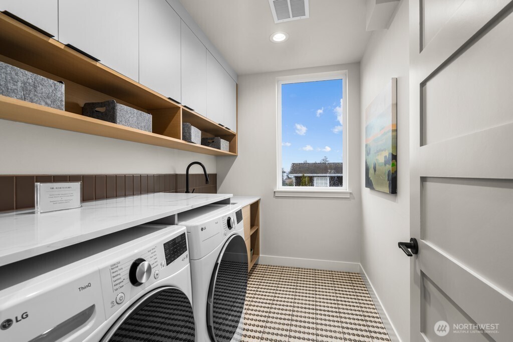 The third upstairs bedroom with spectacular light.