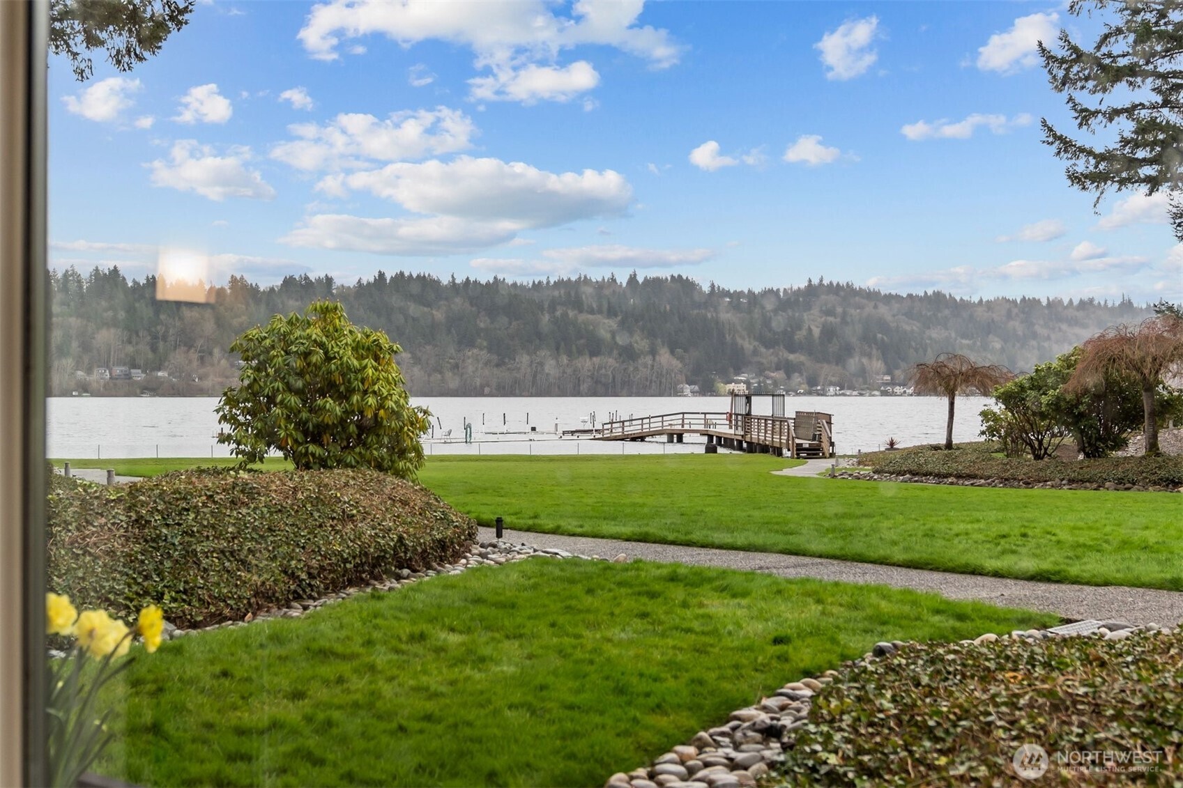 Imagine waking up to this breathtaking, unobstructed lake view—pure bliss every morning as the calm waters greet your eyes.