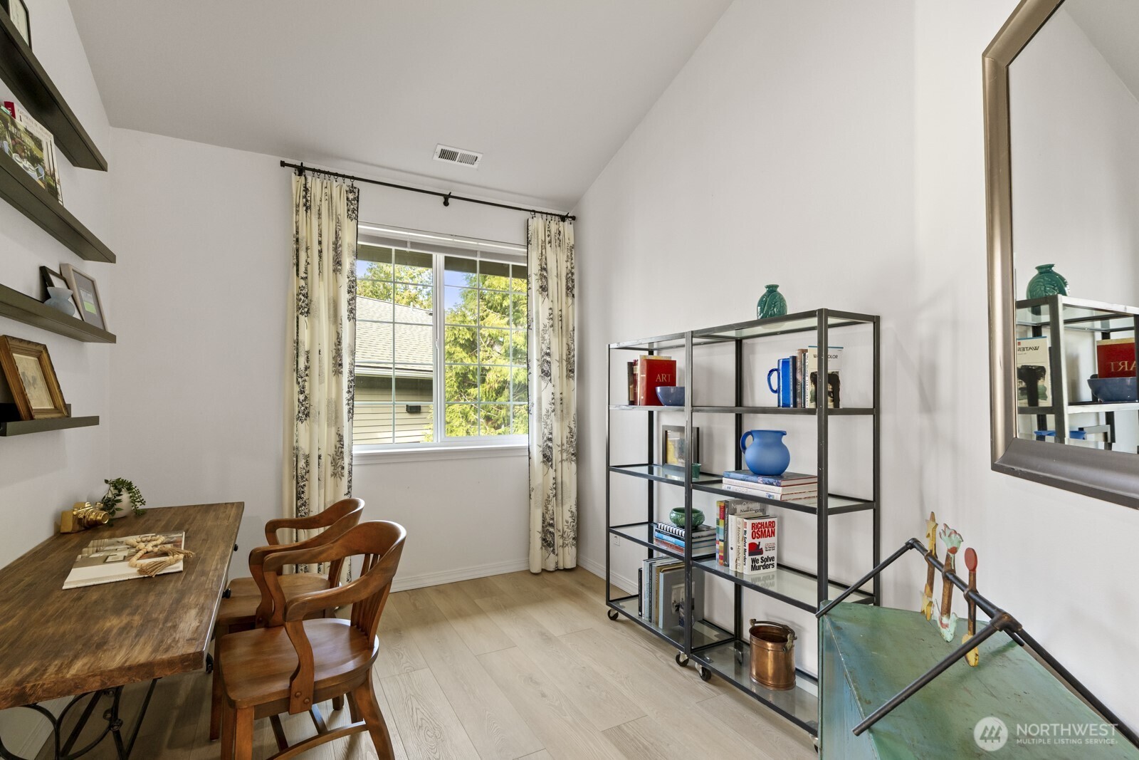 This versatile office/den has so many potential uses!