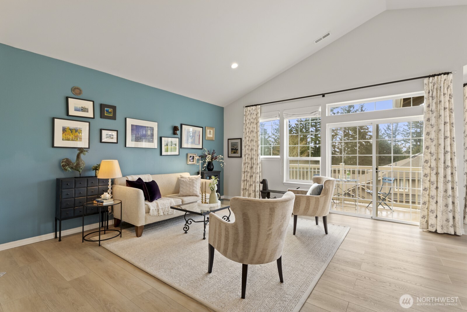 Vaulted ceilings and large windows fill every space with fantastic natural light.