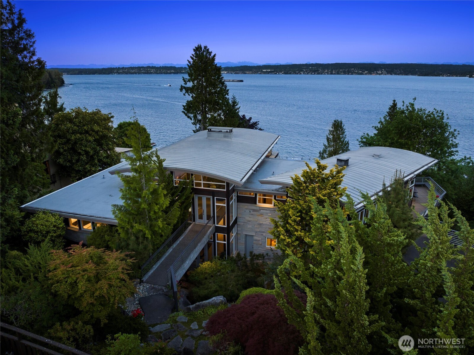 Don’t miss this rarest of opportunities to own one of the great Laurelhurst waterfront retreats!