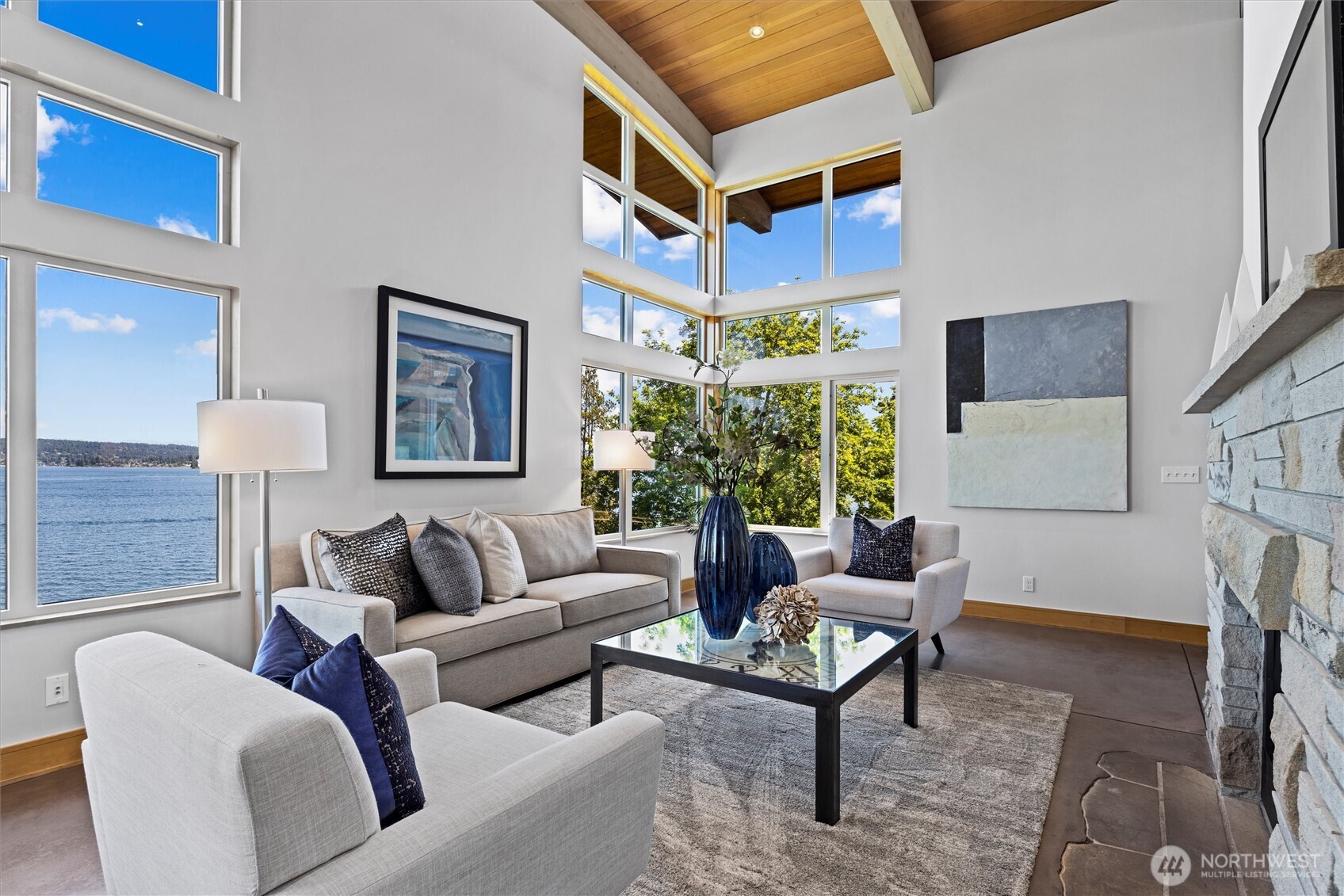 Walls of windows capturing sweeping, panoramic views.