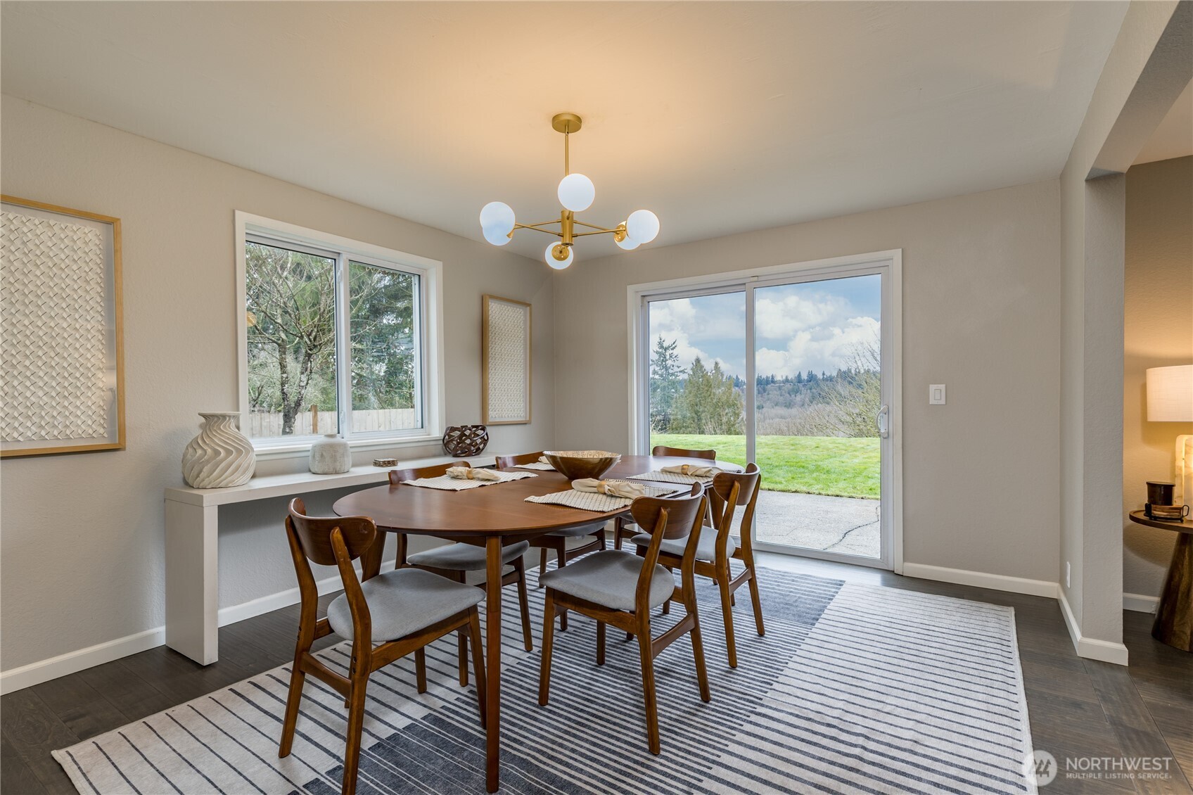 Formal dining room with slider to the back patio