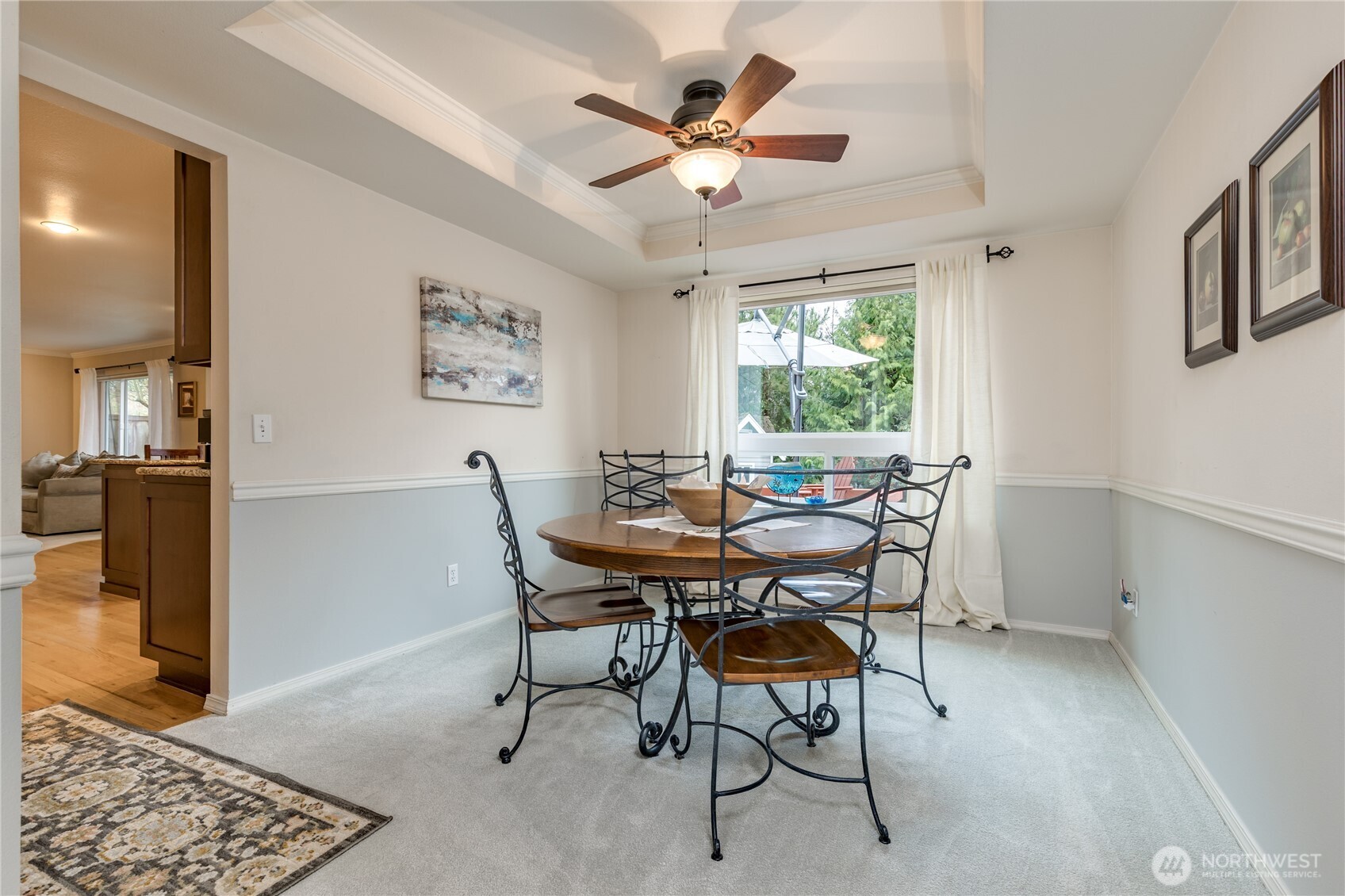 Formal dining room with elegant tray ceiling