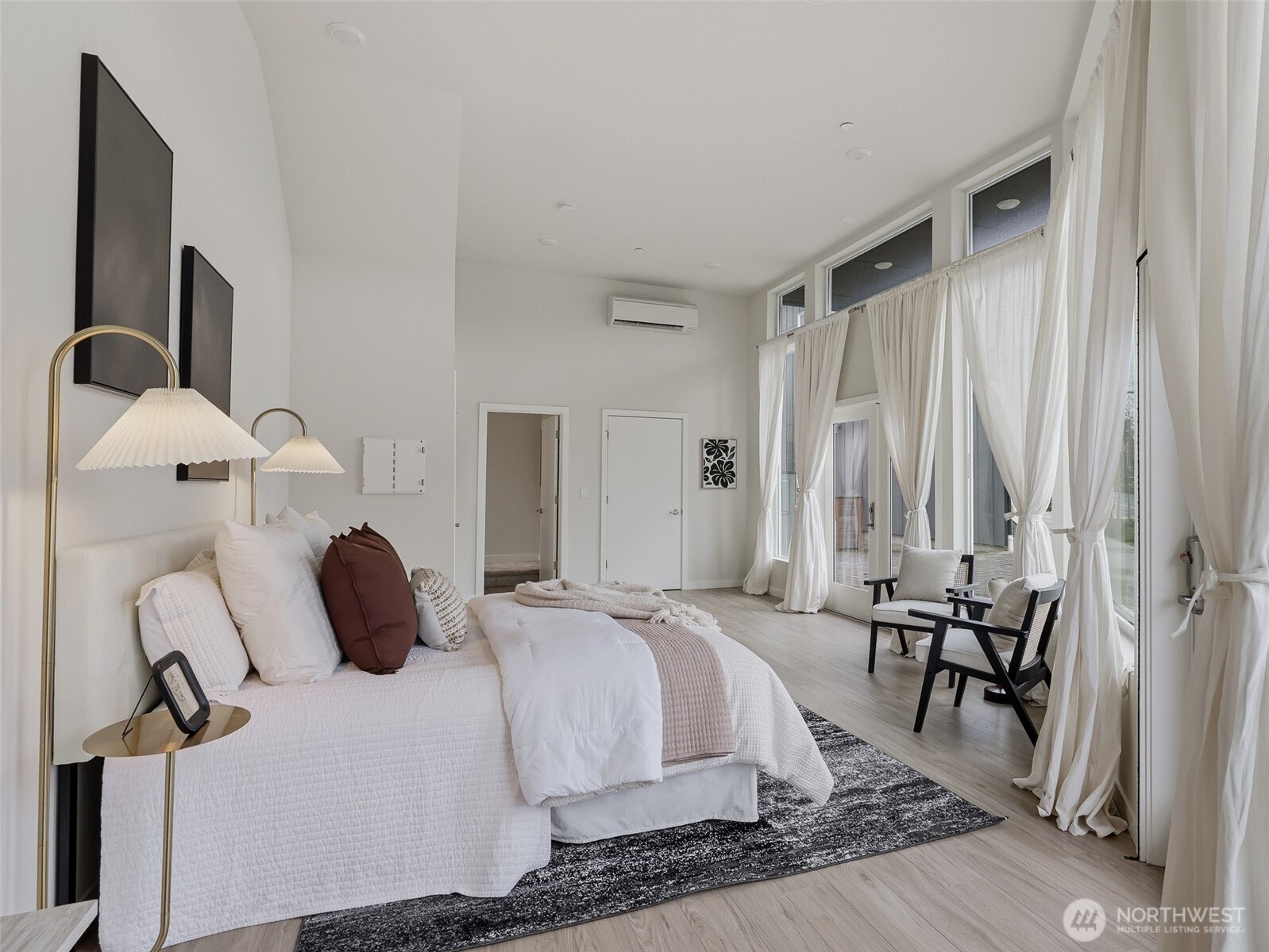 You'll love the bright light and tall ceiling space of this oversized room