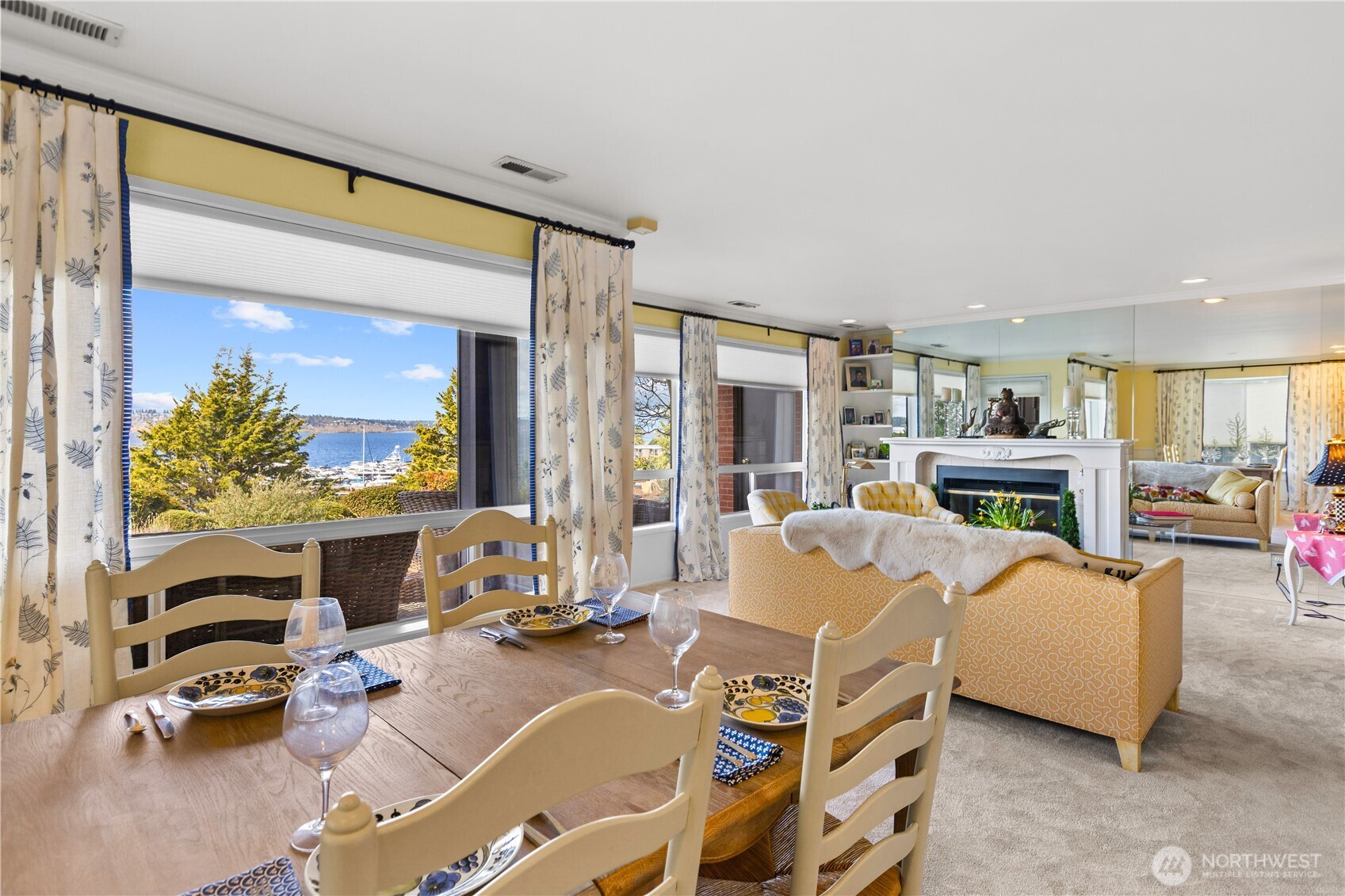 Dining room with view windows and natural light.