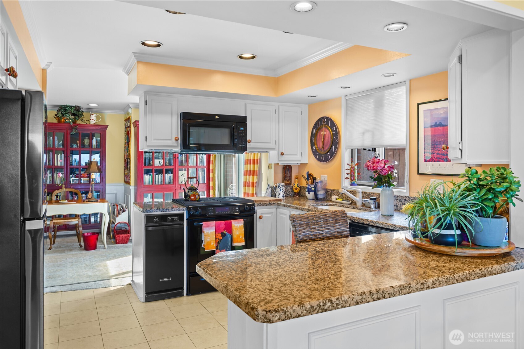 Gourmet kitchen that includes modern appliances, even has a garbage compacter.