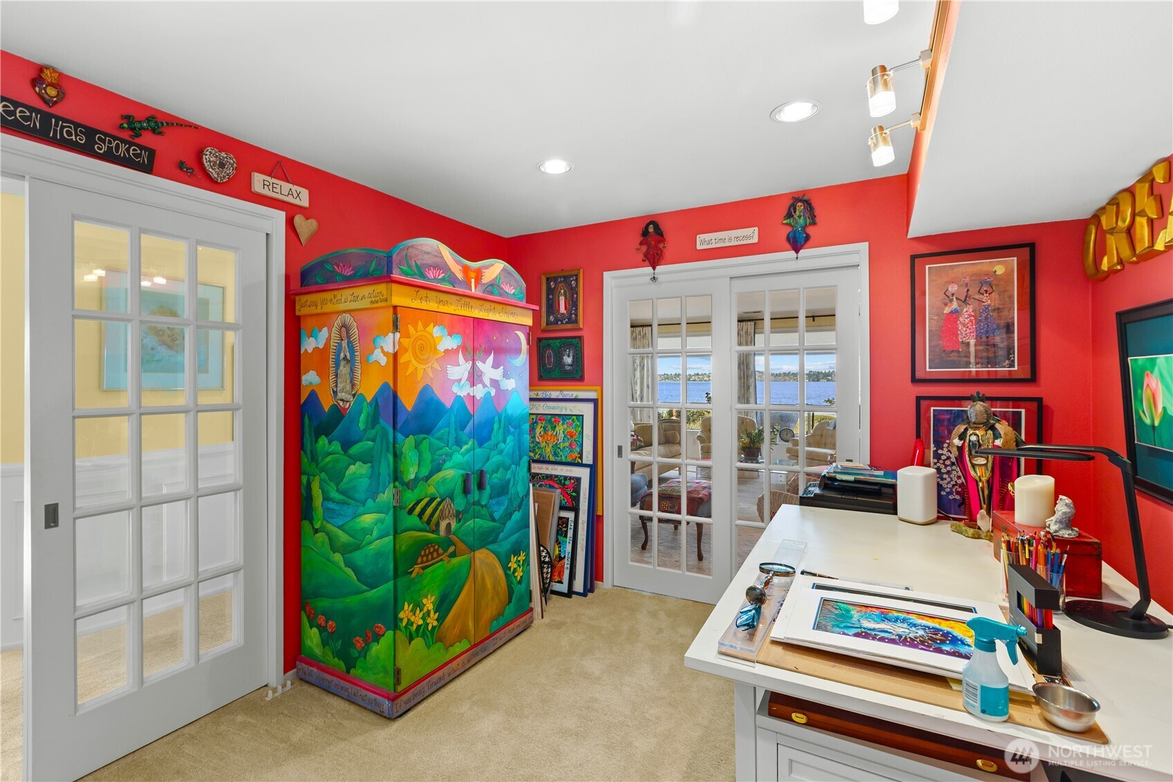 Note all of the cabinets in the bonus room.