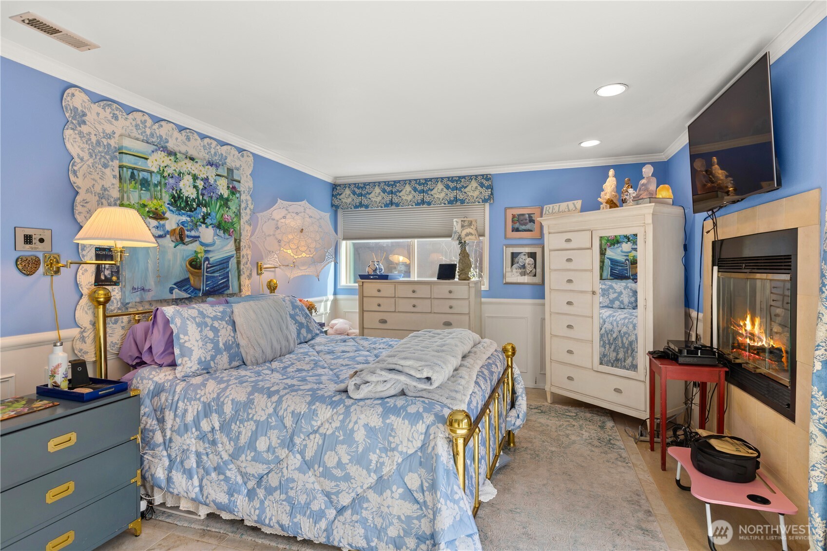 Primary bath with double sinks and granite counter.