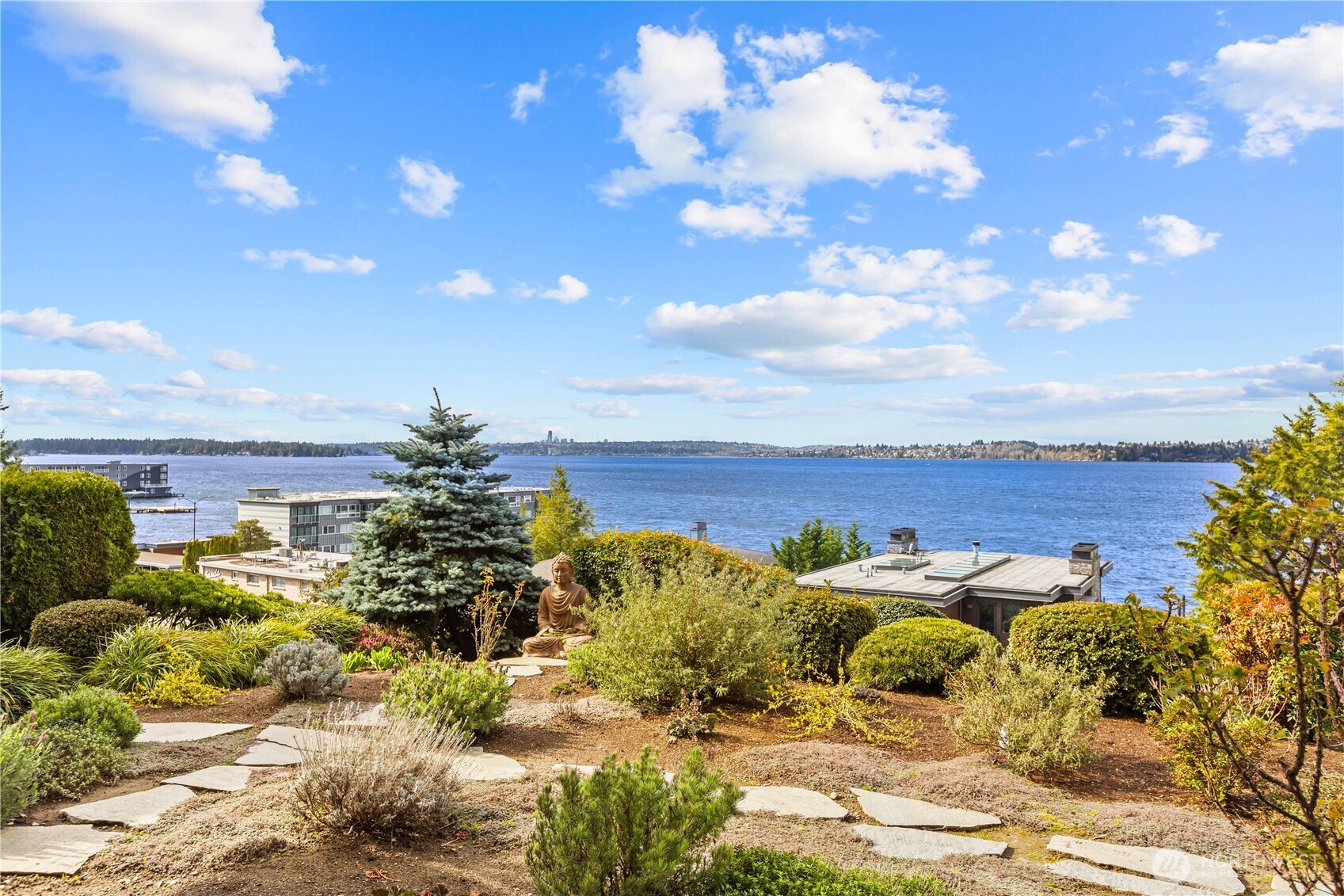 Unobstructed views of Lake, Olympic mountains, city and marina.