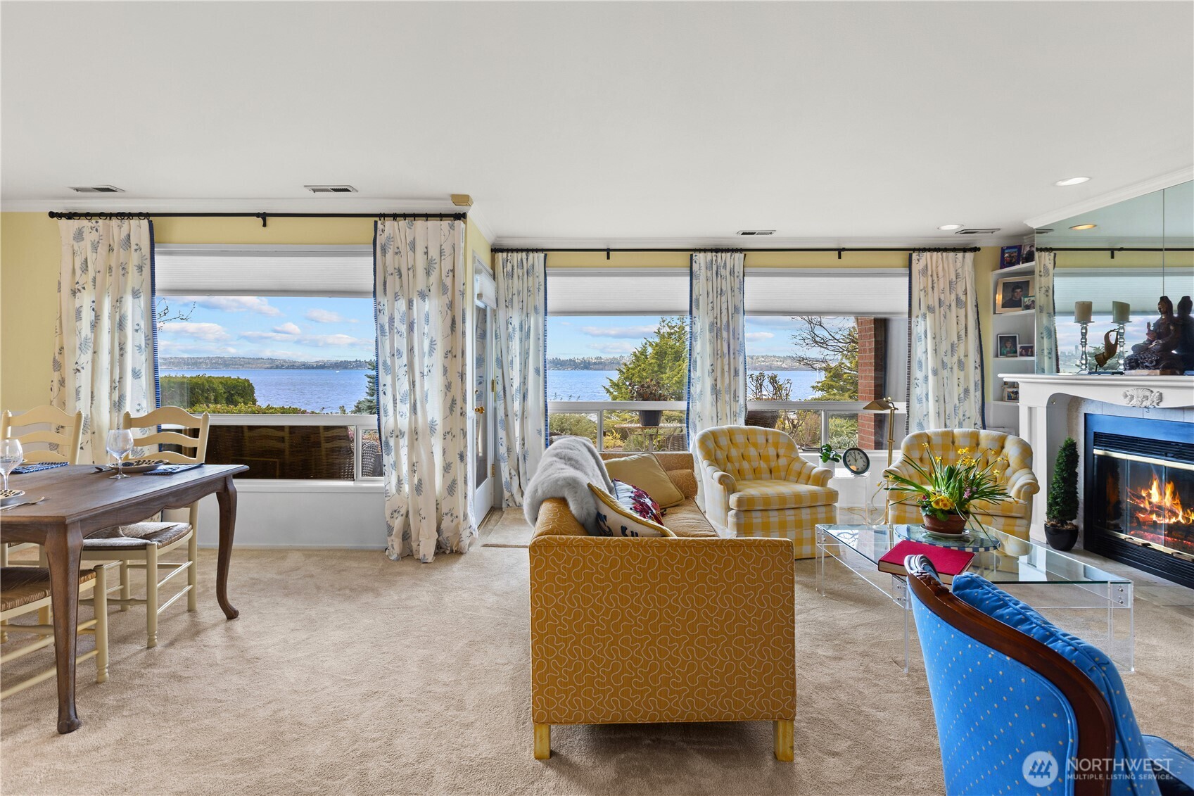 Formal living room with large view windows giving plenty of natural light.