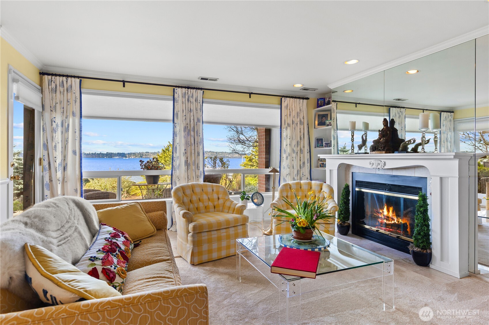 Formal living room with gas fireplace.