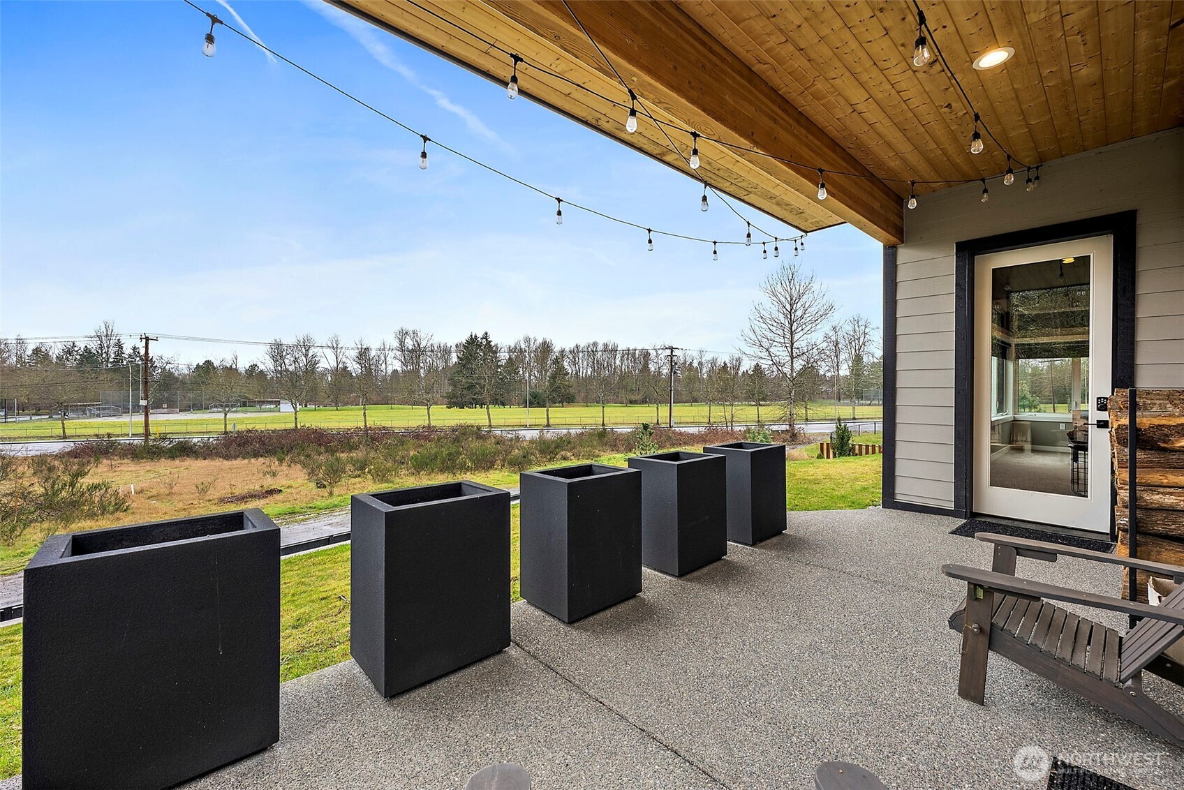 Walk out patio off the 4th bedroom and media room