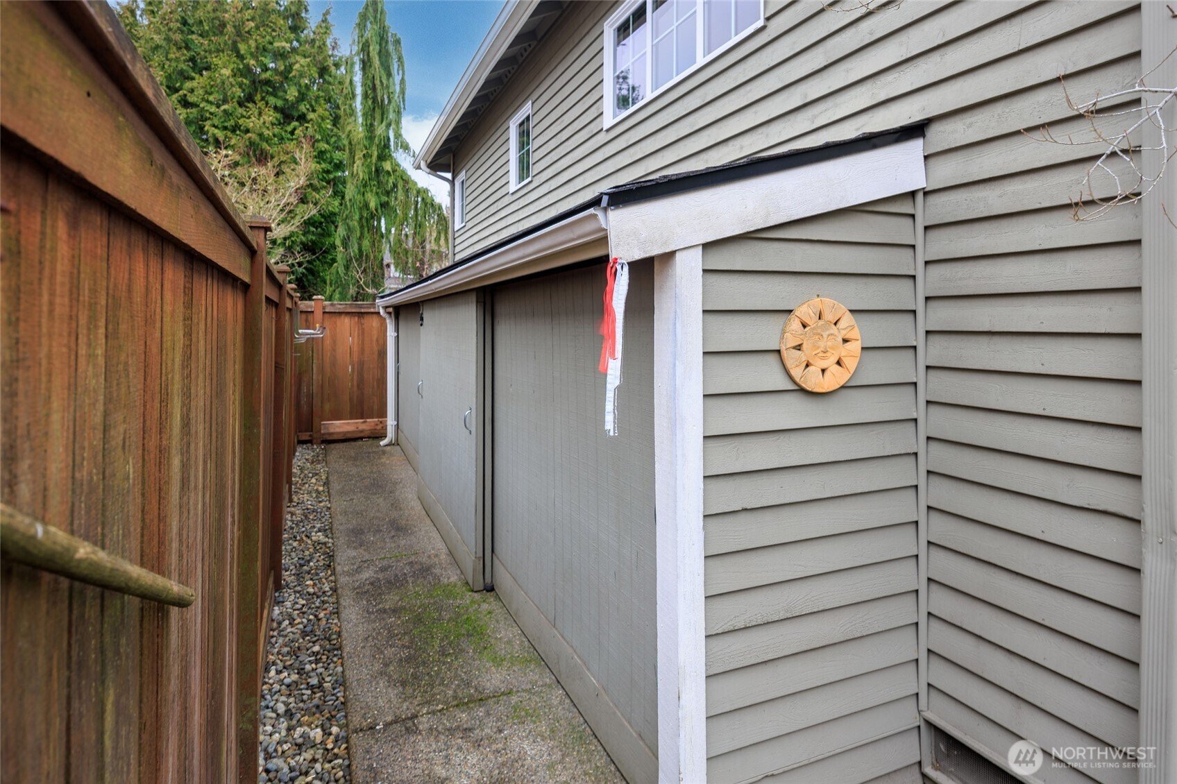 upper level Utility room w/large closet/utility sink and upper storage cabinets.