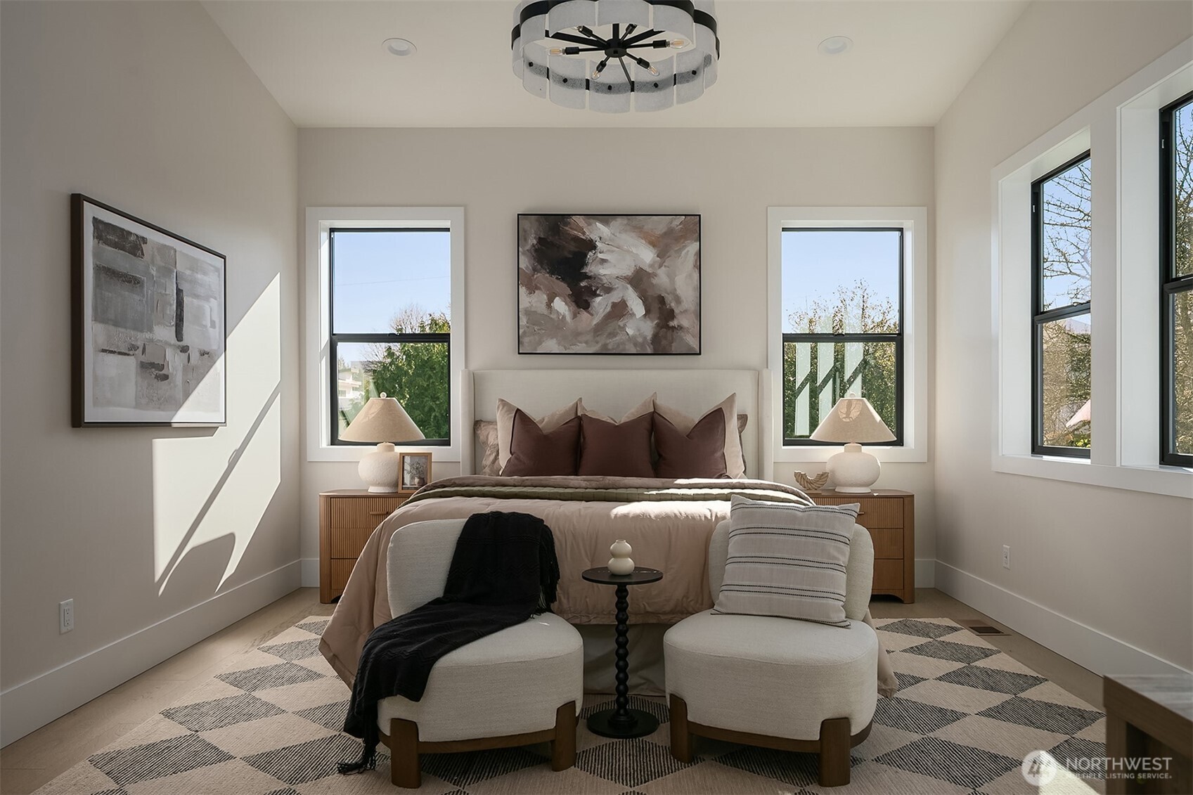 A luxurious primary suite with vaulted ceilings, creating a serene and spacious retreat designed for comfort and tranquility.