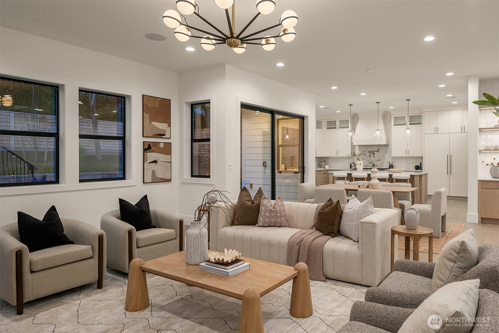 A fully integrated smart home system includes iPad controls, smart doorbell, irrigation, thermostat, Sonos Amp audio, dimmable lighting, Cat-6 wiring, eight ceiling speakers, and motion-activated lighting in pantry, closets, and garage.