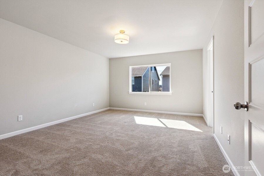 **Photos of simlar floorplan in another community. Features and specs will vary**