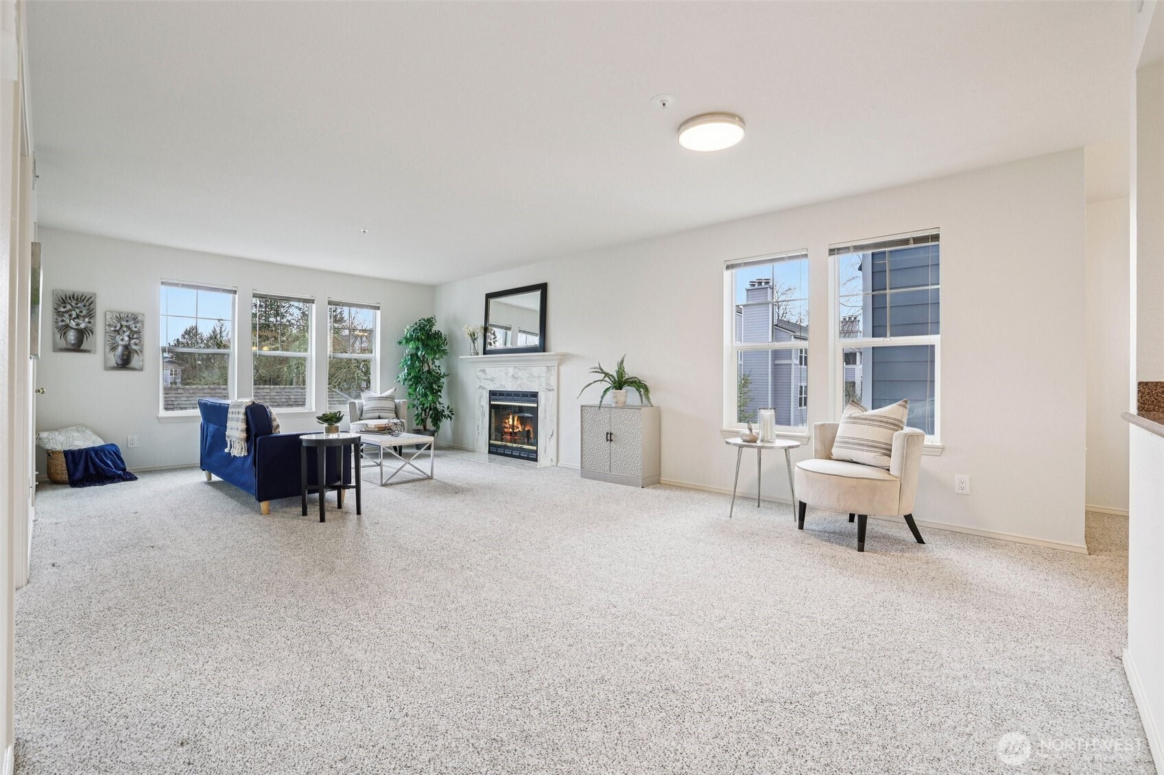 Windows bring in natural light and ample opportunity to decorate unique spaces in the large living areas