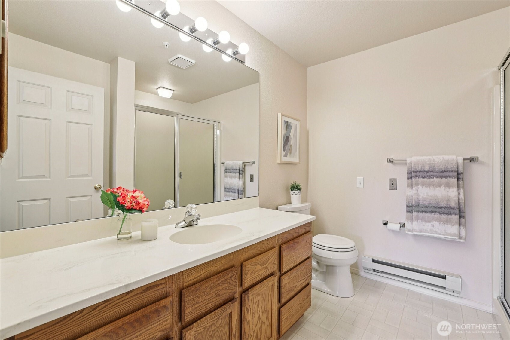 Primary bathroom step in shower with seats