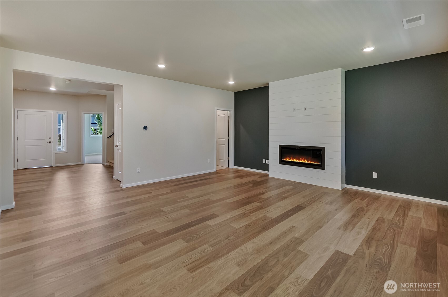 Photos are taken of a Shelby plan previously built in the community.