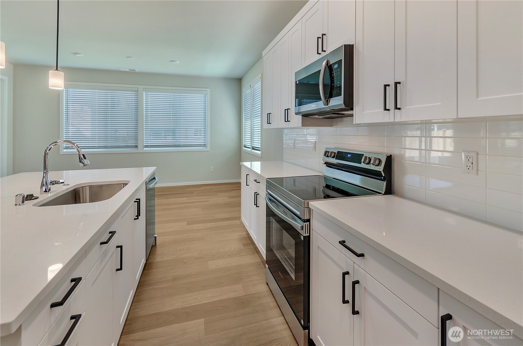 Photos are taken of a Shelby plan previously built in the community.